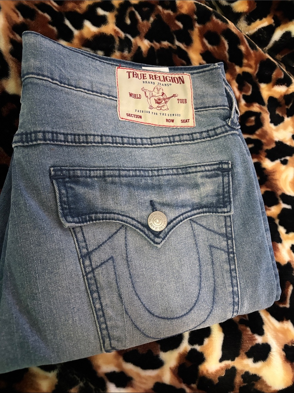 True Religion Women's Light Blue Boot Cut Jeans with Signature Pocket
